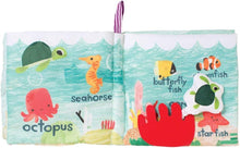 Load image into Gallery viewer, The Manhattan Toy Company - What's Outside Sea-Themed Soft Baby Activity Book with Rattle