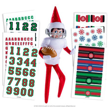 Load image into Gallery viewer, The Elf on the Shelf - 2026 Bundle: ElfieGram Ski Set, Dashing Dino, Santa Party Dress, Jolly Jersey Football, Candy Cane PJs &amp; Elf Mates Shirts