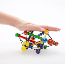 Load image into Gallery viewer, The Manhattan Toy Company - Skwish Classic Wood Rattle and Teether Toy